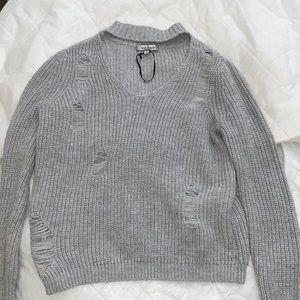Cute grey sweatshirt with distress holes